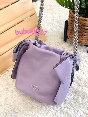 NWT🎀Coach Faye Mini Drawstring Bag
With Bows Light Amethyst Purple Chain CEL03